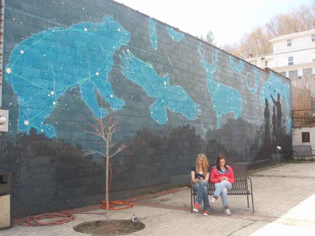 Kirsten Chapman and Teara Stout, in front of a mural in Richwood. They attend Richwood Middle School. 
